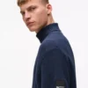 Afslappet rullekravesweater