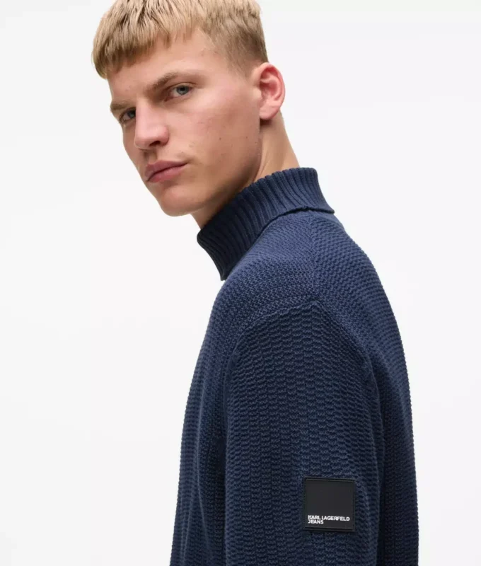 Afslappet rullekravesweater