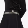 Bouclé-detaljeret striknederdel