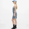Coated denim miniskirt