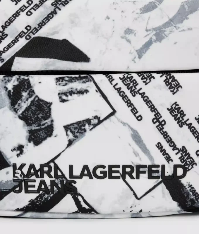 Crossbody-taske med grafisk mønster over hele tasken