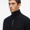 Halvzip-rullekravesweater
