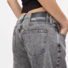 Jeans med mellemhøj talje og tøndeformede ben