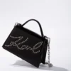 K/Signature lille crossbody-taske med nitter