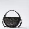 K/Signature rund crossbody-taske med pailletter