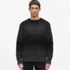 Kabelstrikket sweater
