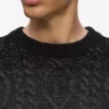 Kabelstrikket sweater