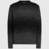 Kabelstrikket sweater