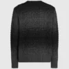 Kabelstrikket sweater