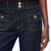 Lige jeans med knapdetaljer