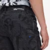 Lige jeans med monogram overalt