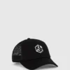 Monogram trucker-kasket
