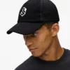 Monogram trucker-kasket