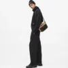Praktisk crossbody-taske med snøre