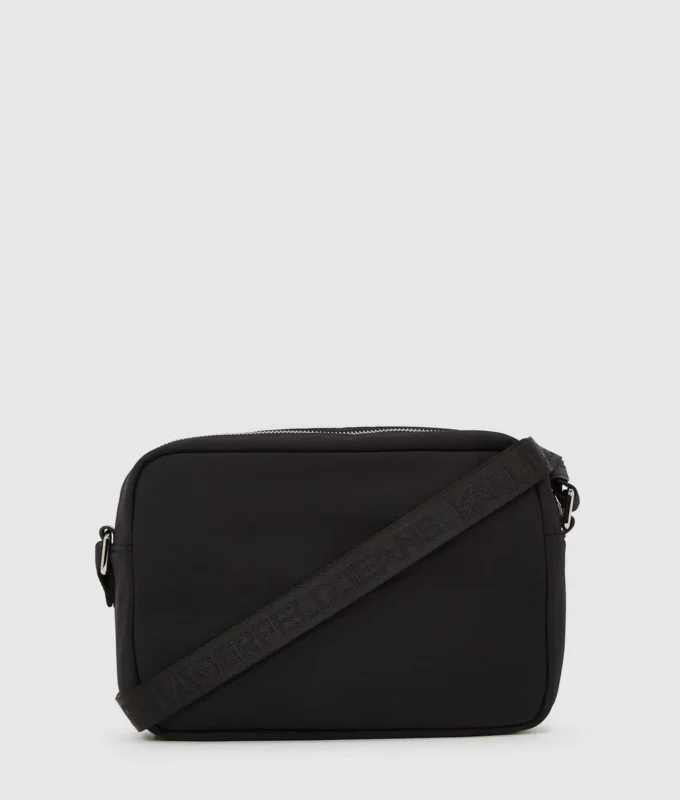 Praktisk crossbody-taske med snøre