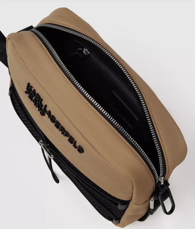 Praktisk crossbody-taske med snøre