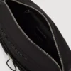 Praktisk crossbody-taske med snøre