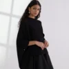 RIBSTRIKKET PONCHO