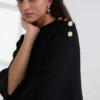 RIBSTRIKKET PONCHO