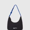 Skuldertaske i nylon med snor