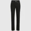 Slim jeans med metalliske detaljer