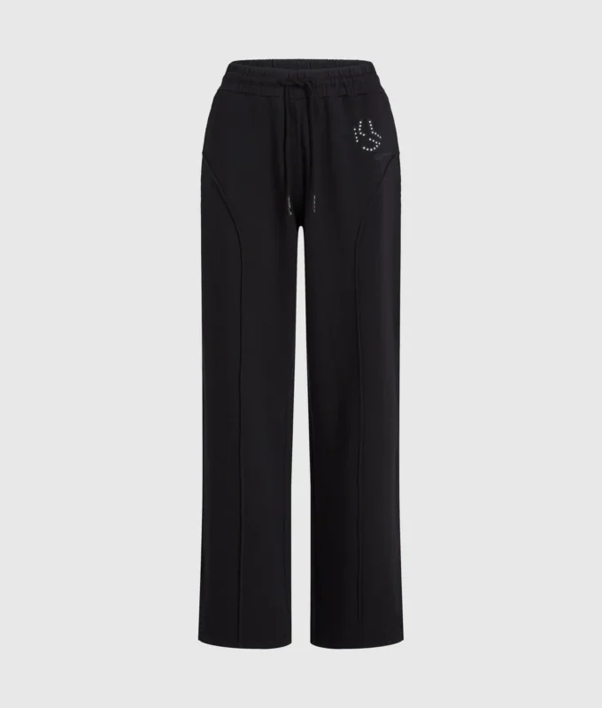 Sweatpants med monogram og nitter
