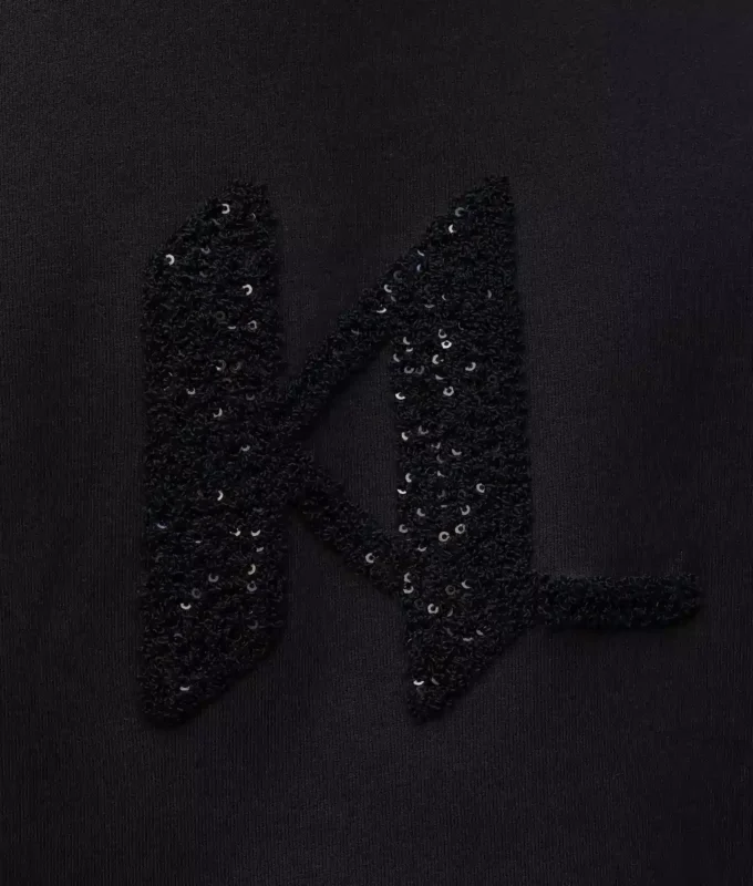Sweatshirt med pailletmonogram