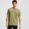T-SHIRT MED BRYSTLOMME