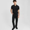 TAPERED JEANS MED LYNLÅS