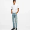 Tapered jeans med malingsstænk