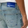 Tapered jeans med malingsstænk