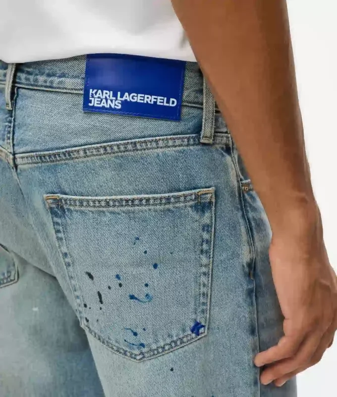 Tapered jeans med malingsstænk