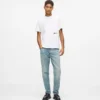 Tapered jeans med malingsstænk