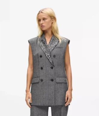 Tweedvest med pailletter på revers