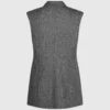 Tweedvest med pailletter på revers