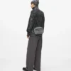 Vaskede denim crossbody taske